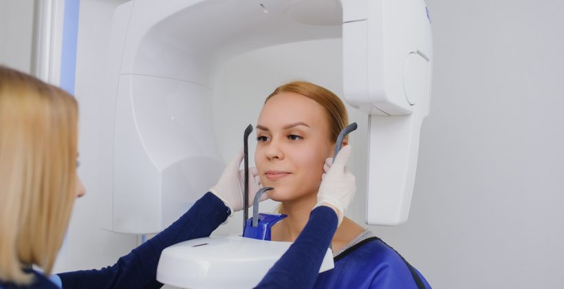 woman getting an x-ray of her mouth